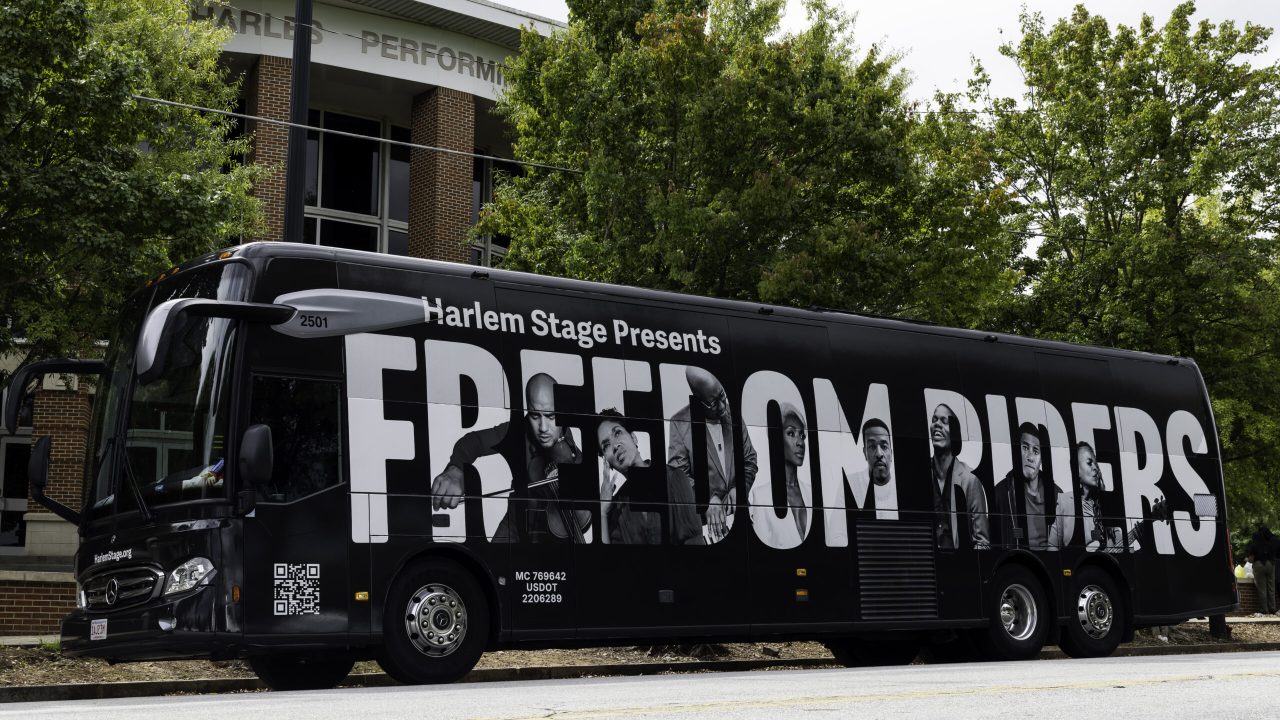HarlemStage-bus-wrap-scaled-1.jpg